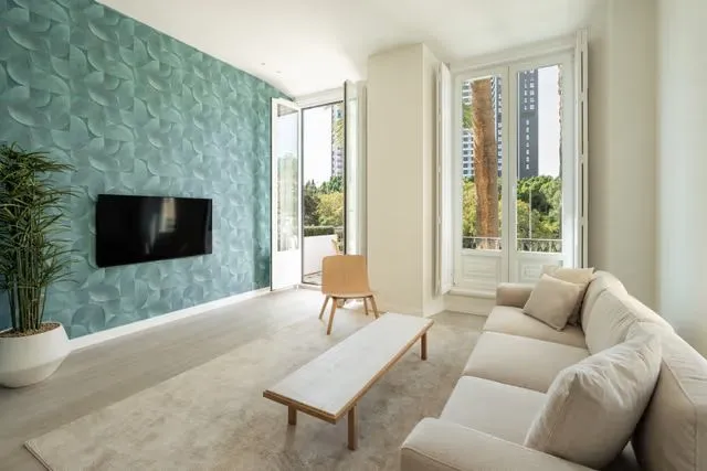 corporate-housing-malaga-azuri-living-room-teal-wall-dsc04733-640