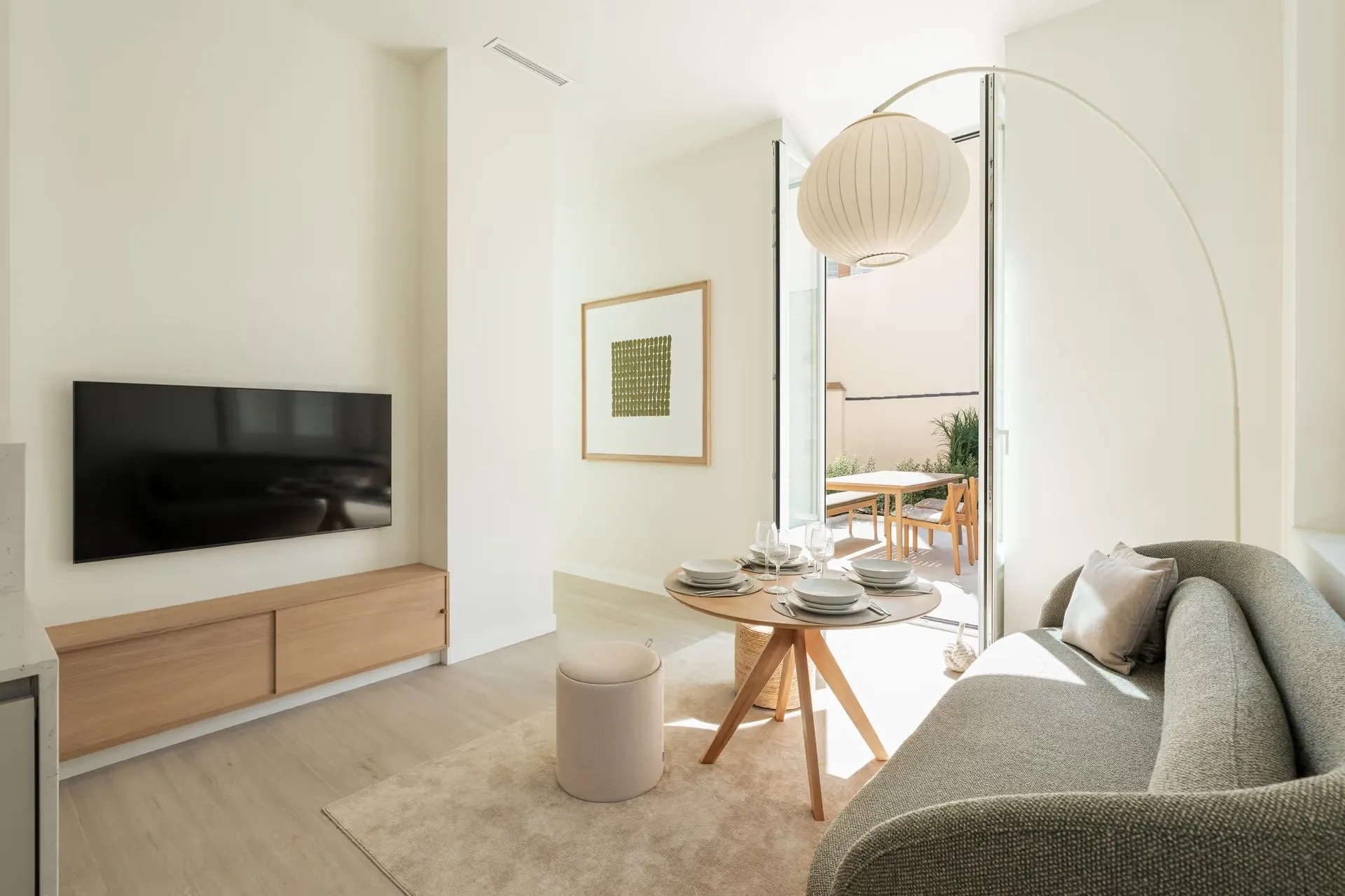 corporate-housing-malaga-oliva-living-room-terrace-view-dsc04075-1920
